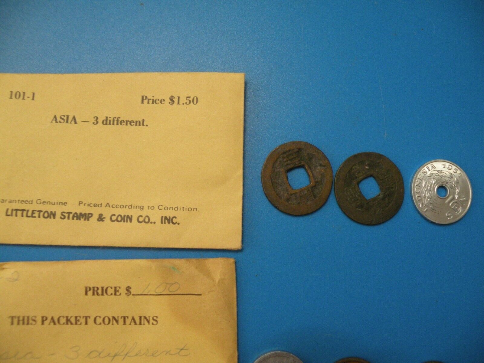 ASIAN COINS LOT OF 45 mixed coins some from Littleton Stamp & Coin M12 - Fresh Stock Dated February 2026