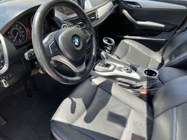 2013 BMW X1 xDrive28i~ ONLY 55K MILES~ CLEAN CARFAX~ 2.0 TURBO 2013 BMW X1, Black Sapphire Metallic with 55259 Miles available now! - Fresh Stock Dated December 2025