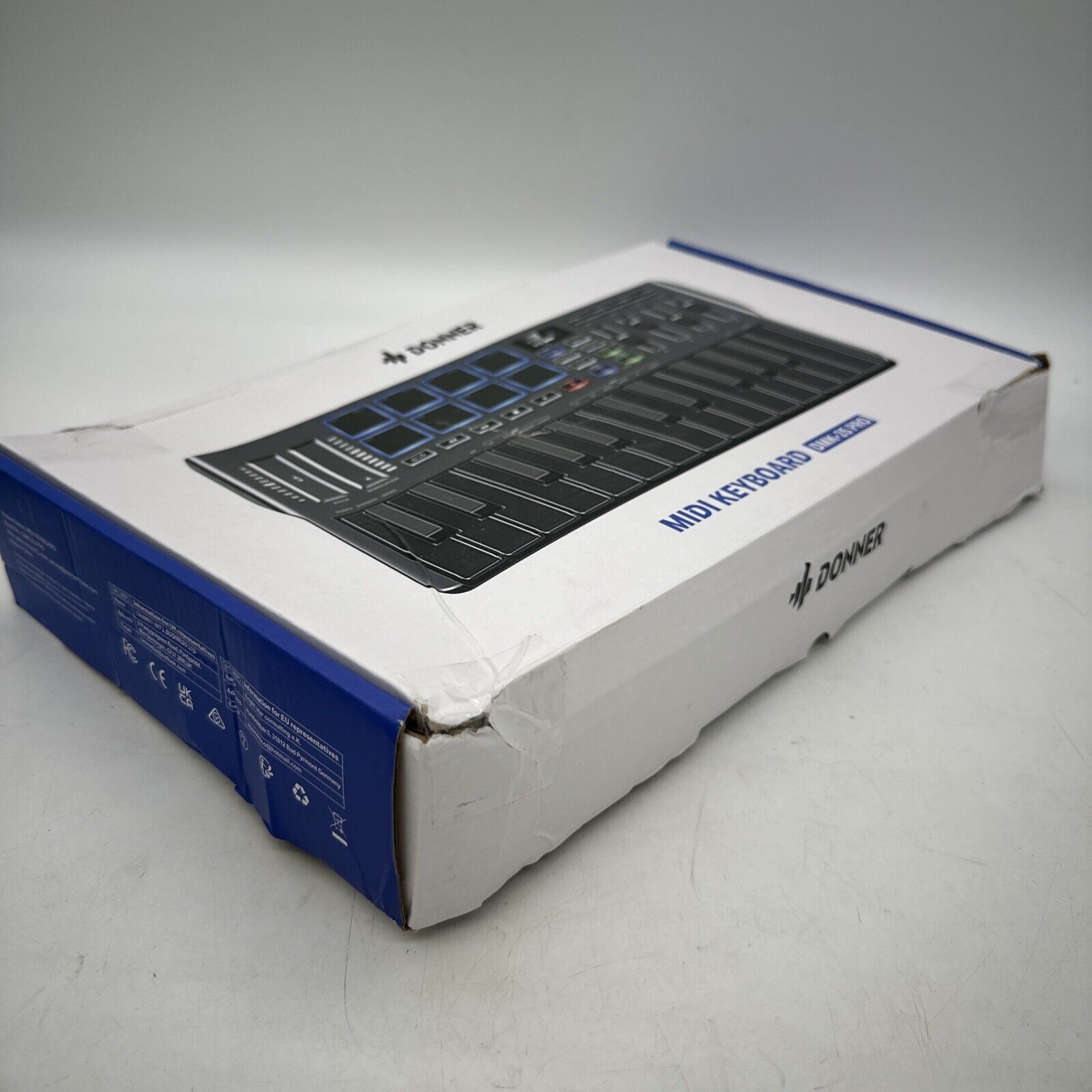 Donner MIDI Keyboard OLED Screen 25 Key 8 Drum Pads Touch Bar DJ Controller Pro - Fresh Stock Dated February 2026