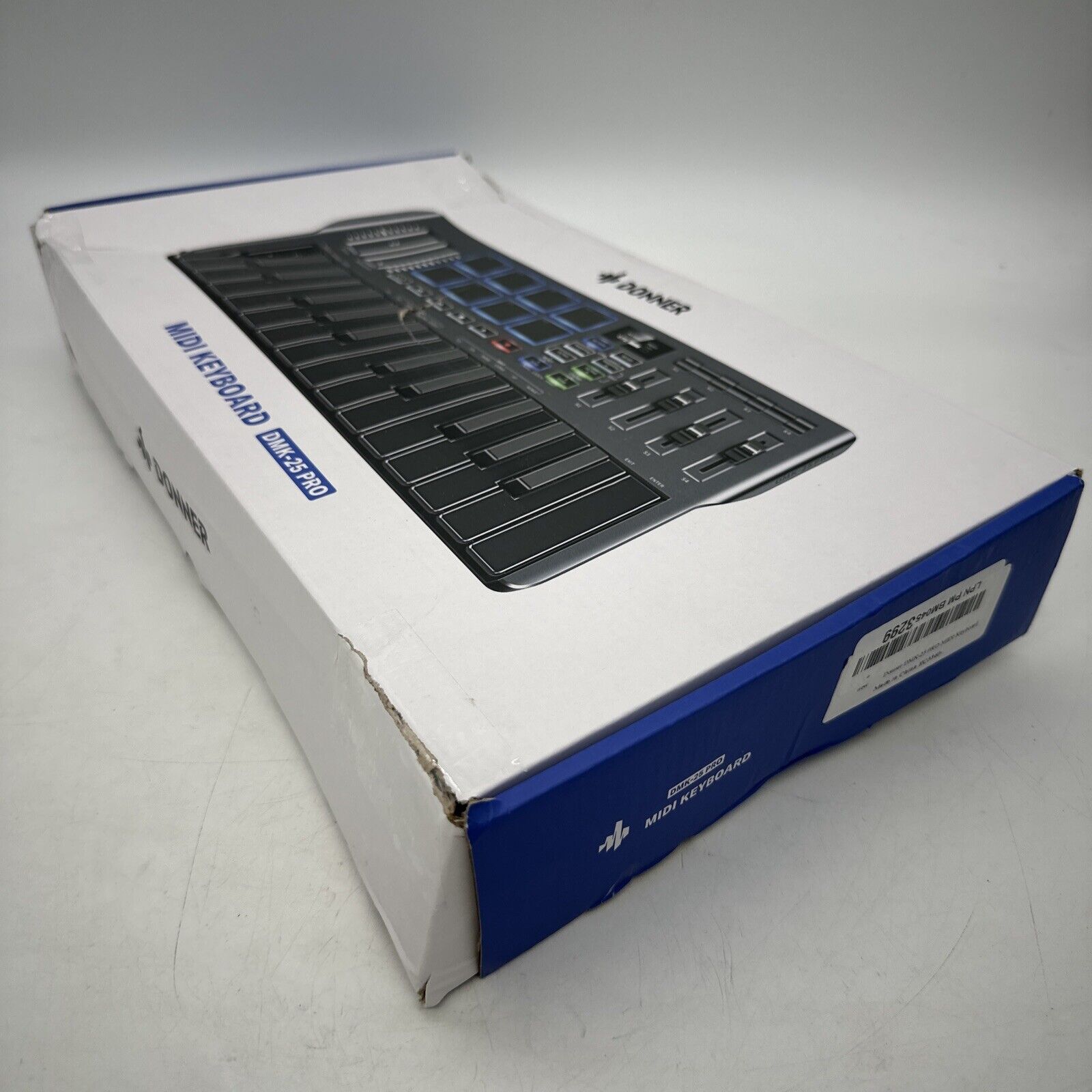 Donner MIDI Keyboard OLED Screen 25 Key 8 Drum Pads Touch Bar DJ Controller Pro - Fresh Stock Dated February 2026