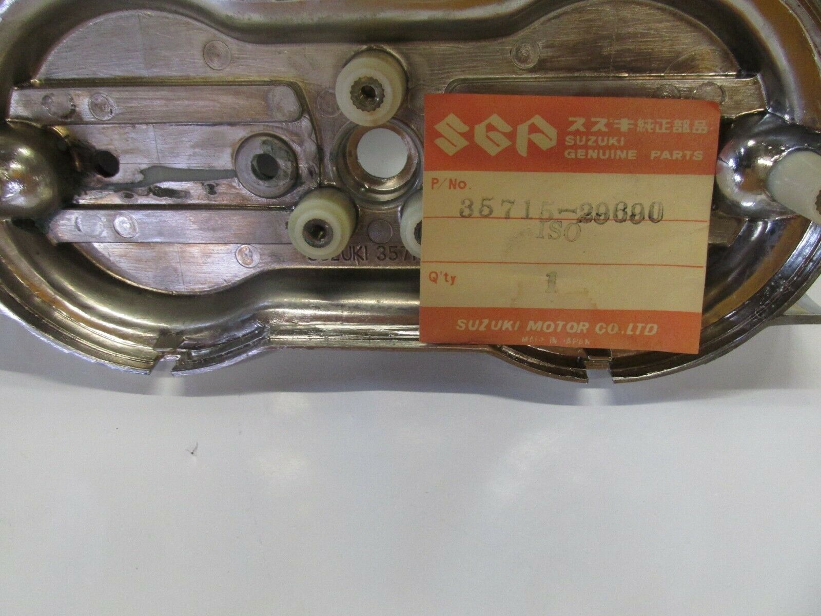 Suzuki NOS TS250 TS90 TS400 T500 T250 T350 tailight backplate 1972  35715-29600 - Fresh Stock Dated February 2026