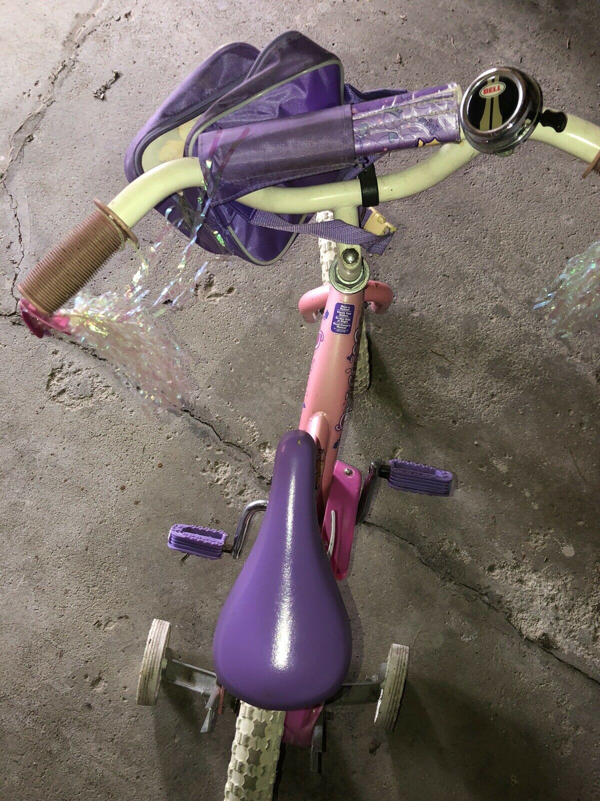Girl’s bike - 12” Disney Princess w/ training wheels, bell and bag PICKUP ONLY - Fresh Stock Dated February 2026
