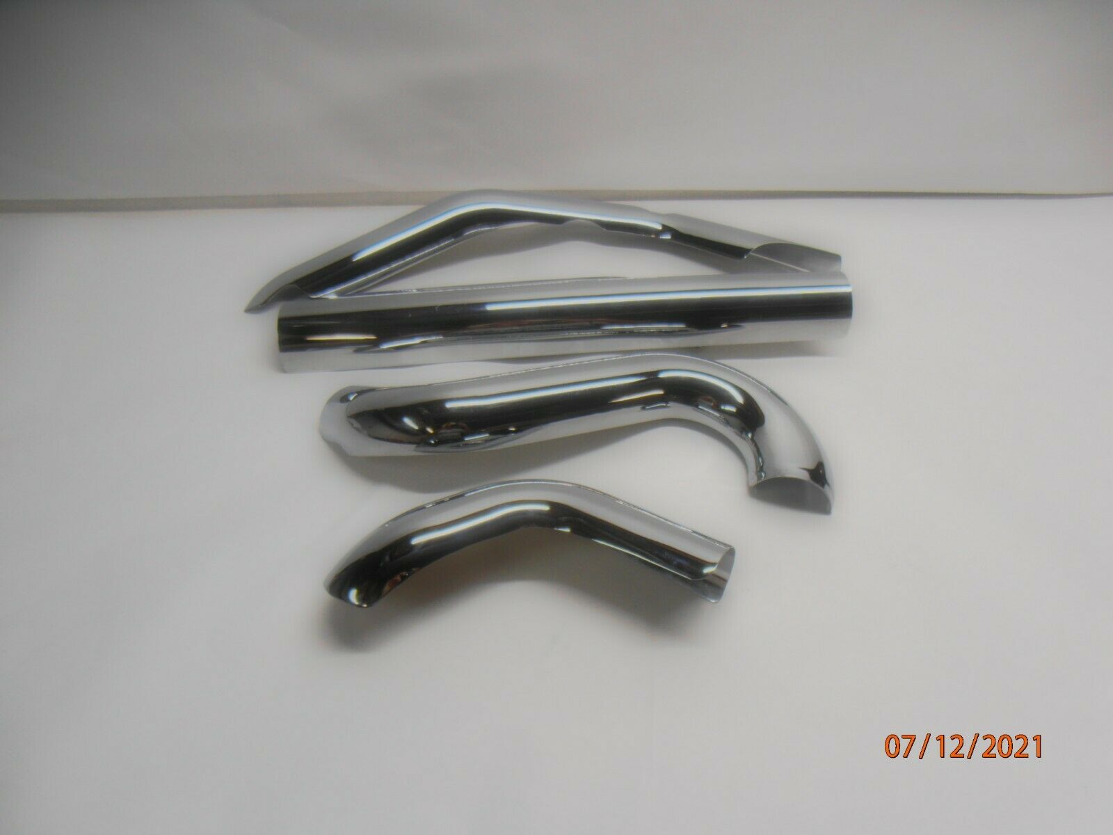Harley-Davidson Touring OEM Chrome Exhaust Heat Shields 2009-2016 P/N 65634-09 - Fresh Stock Dated February 2026
