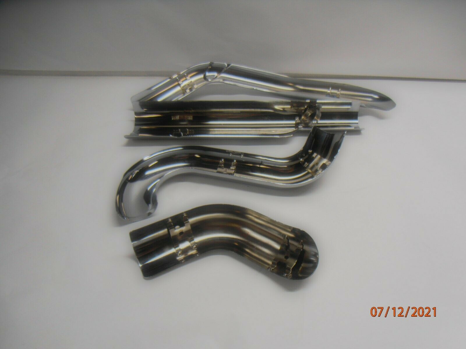 Harley-Davidson Touring OEM Chrome Exhaust Heat Shields 2009-2016 P/N 65634-09 - Fresh Stock Dated February 2026