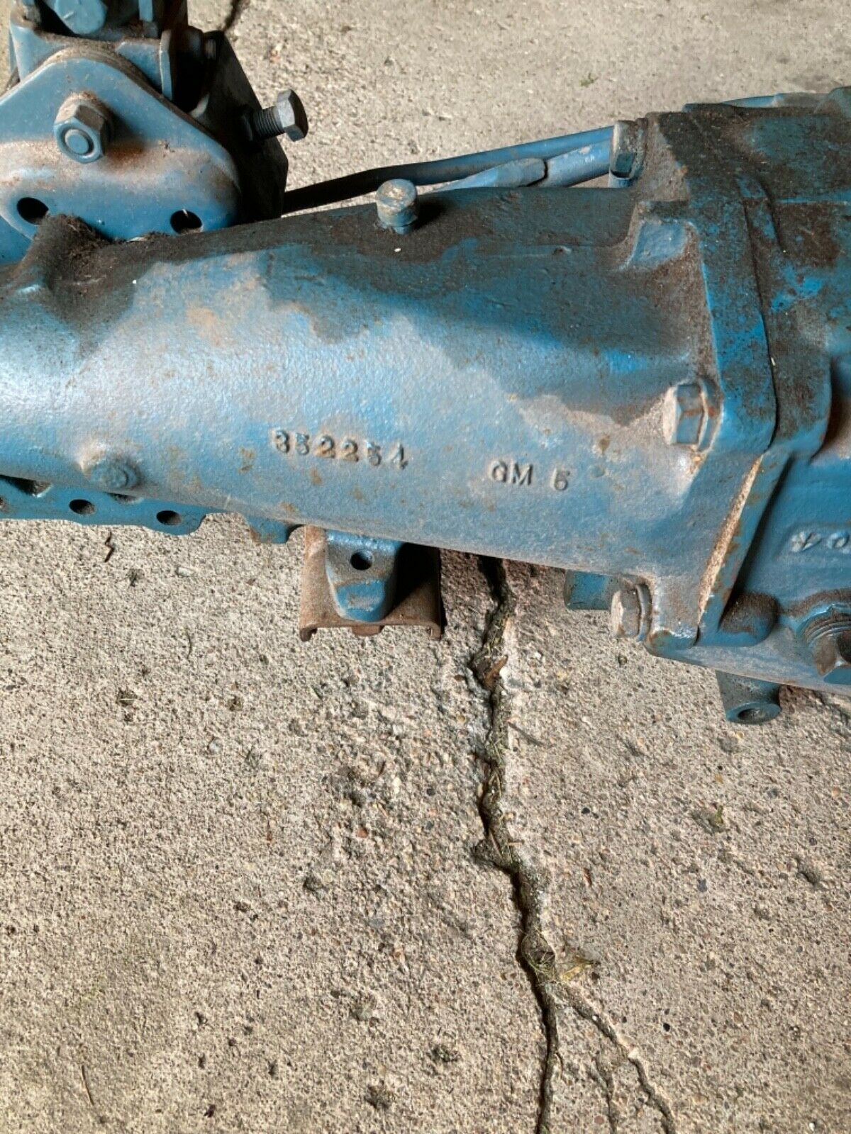 Saginaw 4 speed transmission complete bell housing, shifter and rods 68-73 - Fresh Stock Dated December 2025