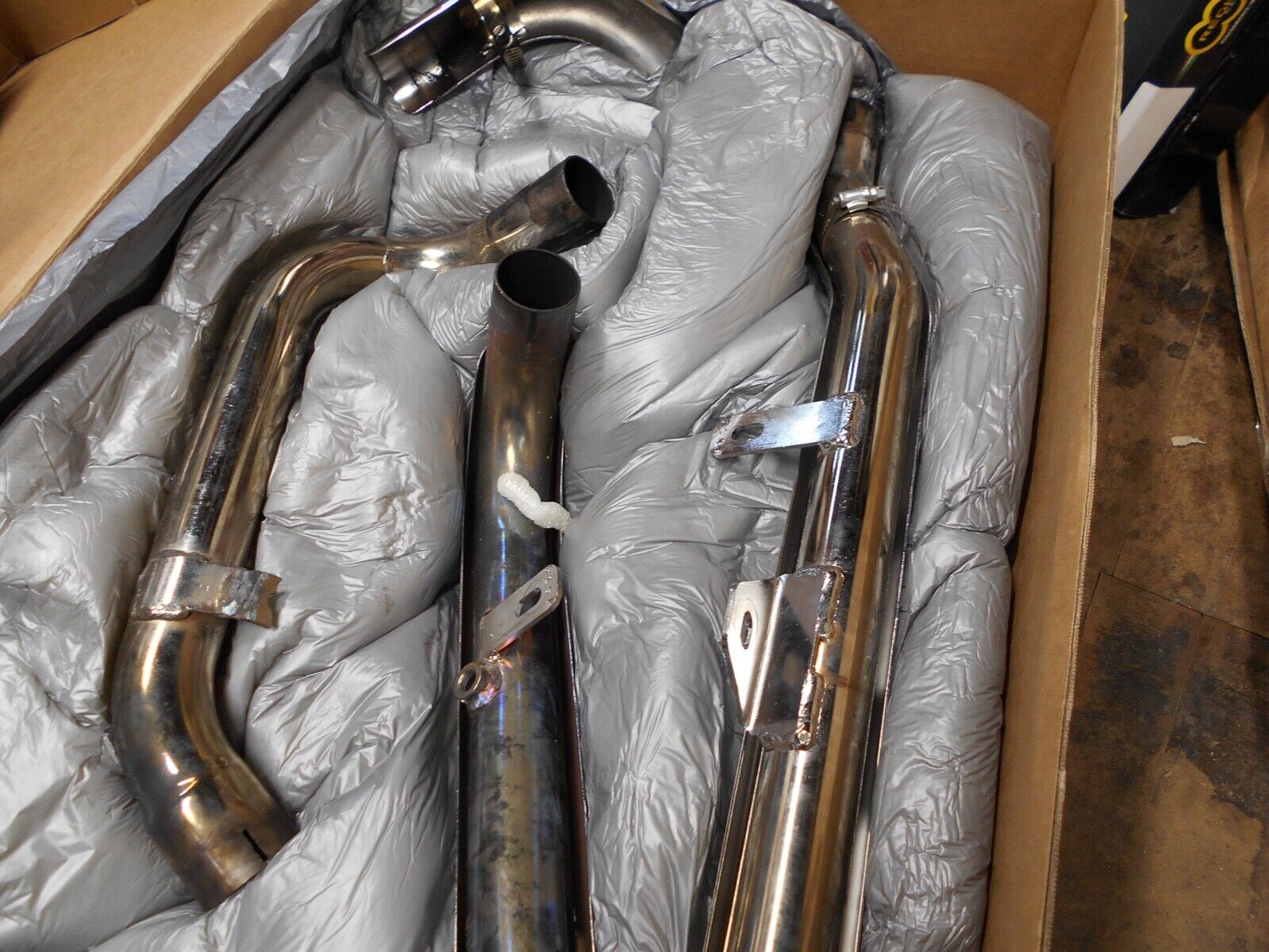 Bassani Manufacturing - 11515A - True Dual Down Under Headpipe with Heat Shield, - Fresh Stock Dated February 2026