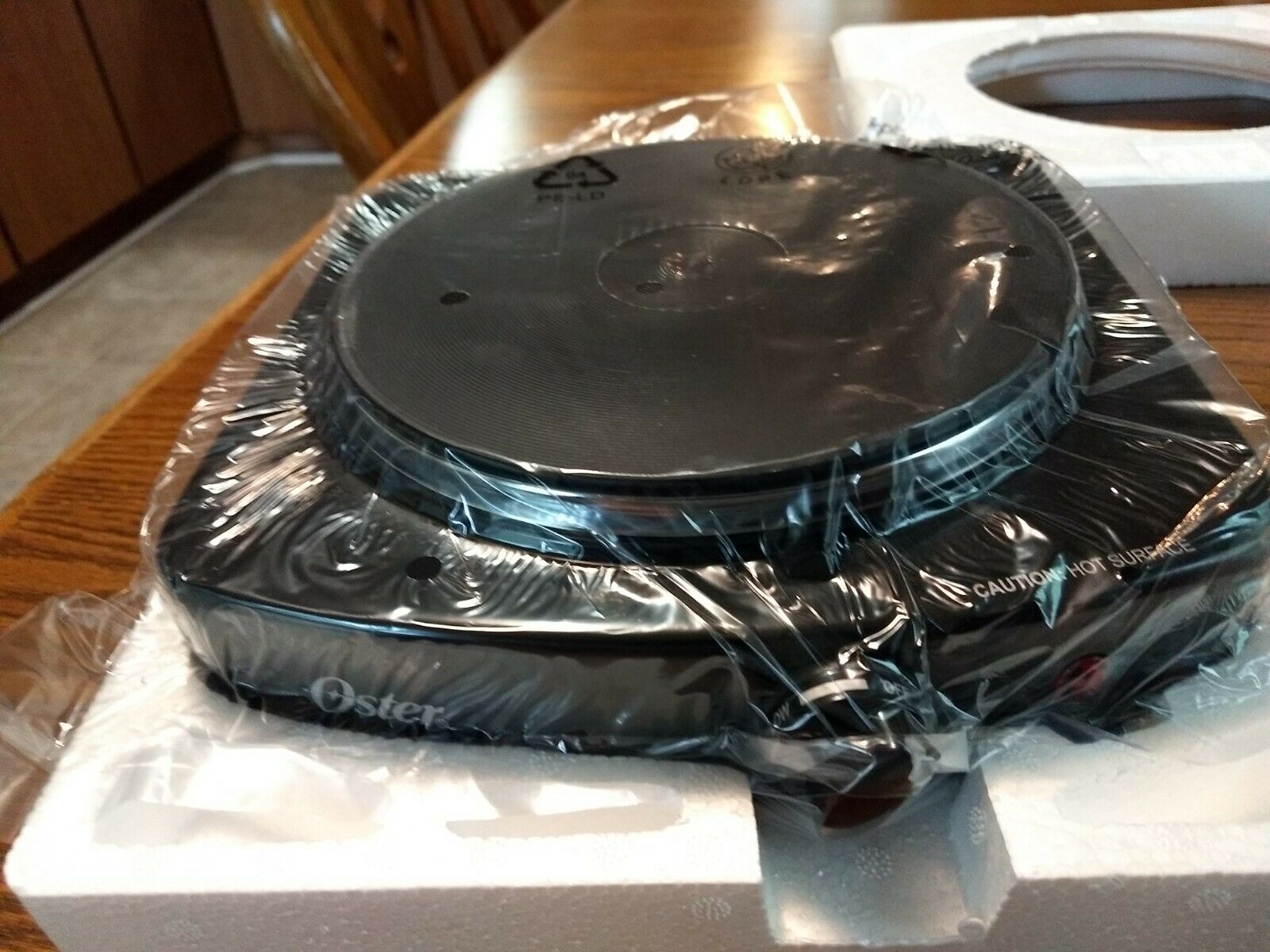 Oster CKSTSB100B015 900Watts Single Burner - Fresh Stock Dated December 2025