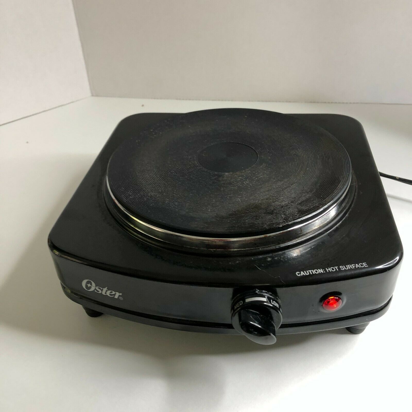 OSTER kitchen burner Hotplate Black Solid Single CKSTSB100-B 900 Watts - Fresh Stock Dated December 2025