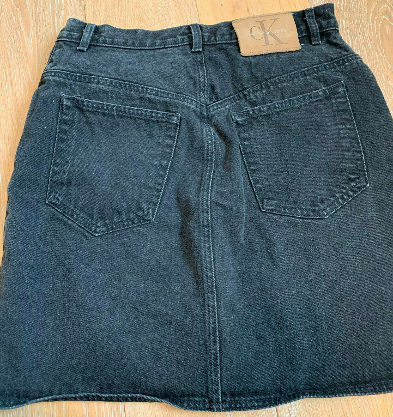 Calvin Klein Black Denim Skirt Size 10 Rivet Closure 100% Cotton Stonewash - Fresh Stock Dated February 2026
