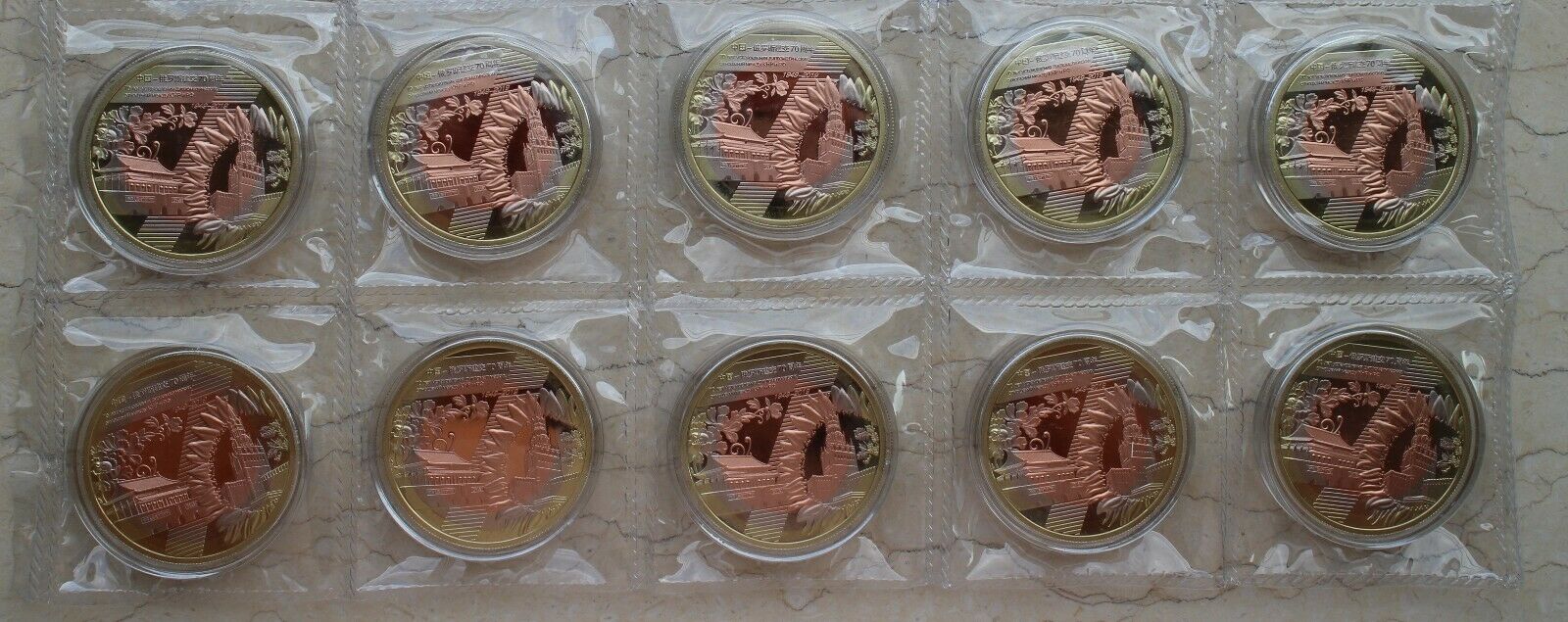 One Sheet of 2019 China 40mm Tri-Metallic Panda Medals - Diplomatic with Russia - Fresh Stock Dated February 2026