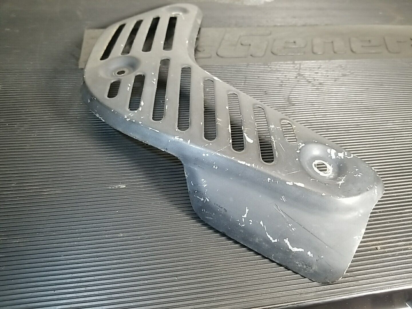 1986-1989 Honda TRX 250R used Exhaust Heat Shield 18319-HB9-003 - Fresh Stock Dated February 2026