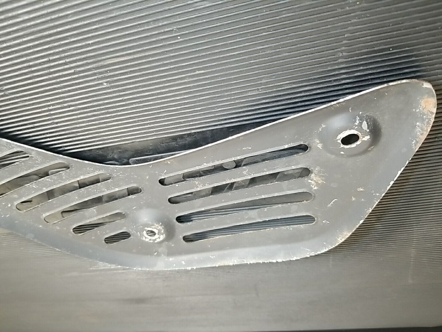 1986-1989 Honda TRX 250R used Exhaust Heat Shield 18319-HB9-003 - Fresh Stock Dated February 2026