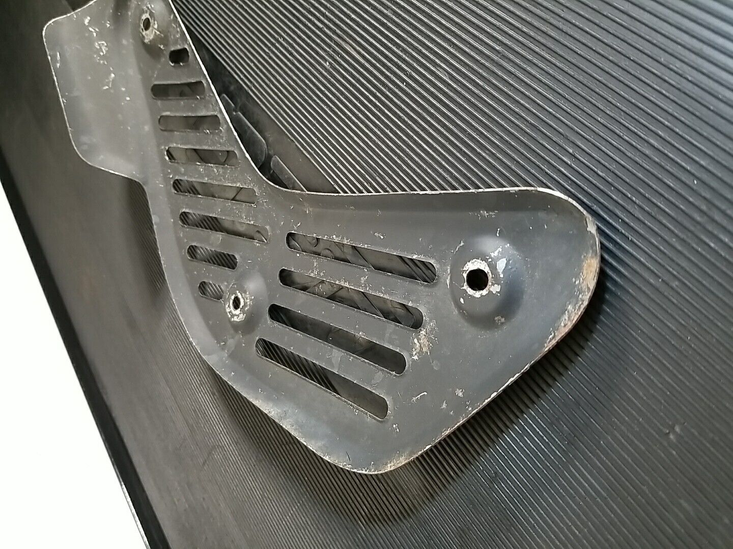 1986-1989 Honda TRX 250R used Exhaust Heat Shield 18319-HB9-003 - Fresh Stock Dated February 2026