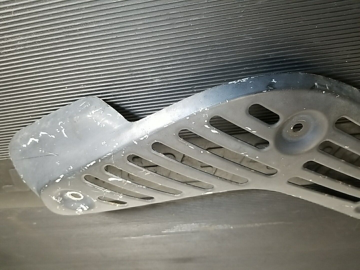 1986-1989 Honda TRX 250R used Exhaust Heat Shield 18319-HB9-003 - Fresh Stock Dated February 2026