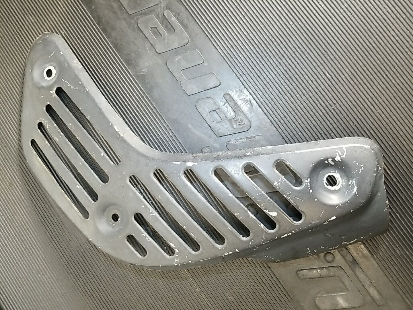 1986-1989 Honda TRX 250R used Exhaust Heat Shield 18319-HB9-003 - Fresh Stock Dated February 2026