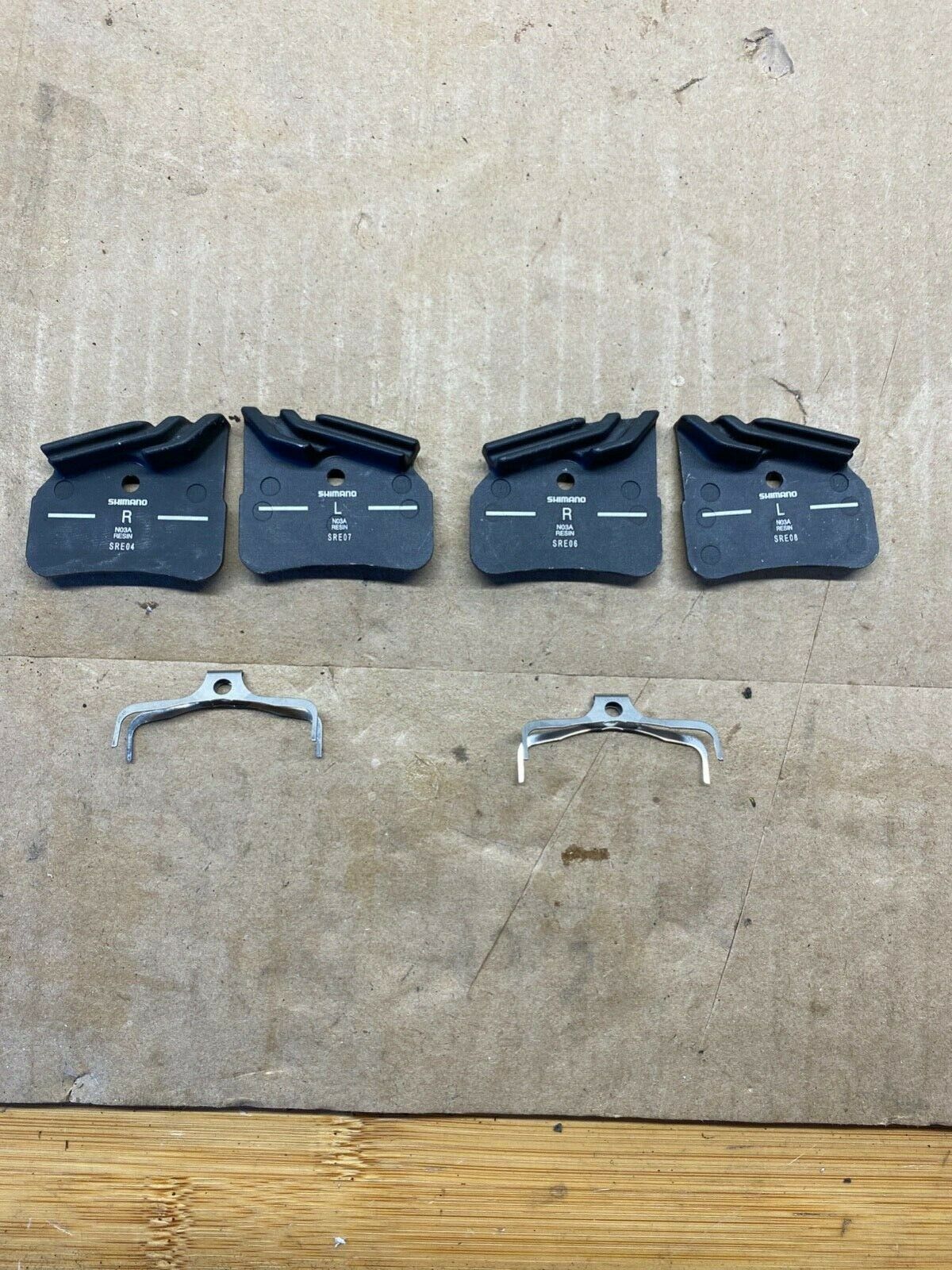Shimano J02A Resin Disc Brake Pads - 2 sets of pads for a total of 4 brake pads - Fresh Stock Dated December 2025