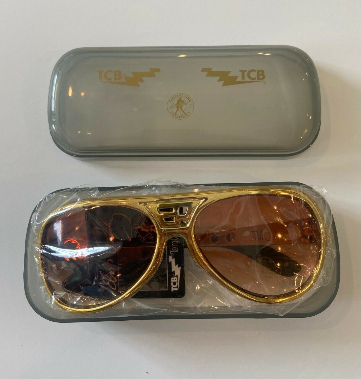 ELVIS PRESLEY SIGNATRUE PRODUCT TCB GOLD & BROWN SUNGLASSES  UV400 - Fresh Stock Dated February 2026