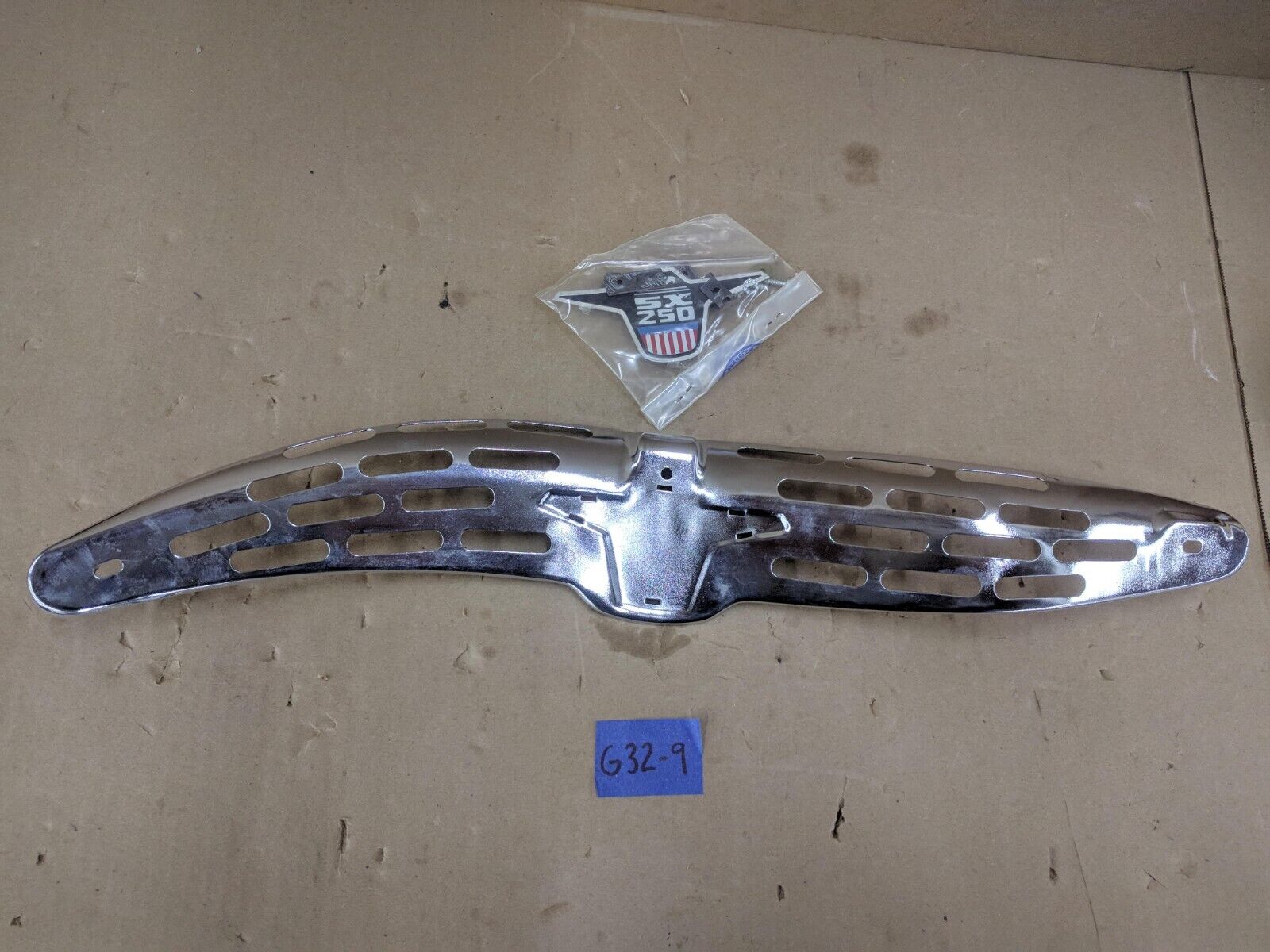 NOS Harley-Davidson Aermacchi SX 250 Exhaust Heat Shield Chrome 65221-75P - Fresh Stock Dated February 2026