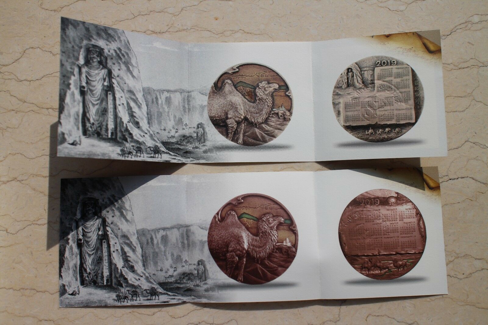 A Pair of China 76mm Enamel Medals (Brass and Copper) - Camel - 2019 Calendar - Fresh Stock Dated February 2026