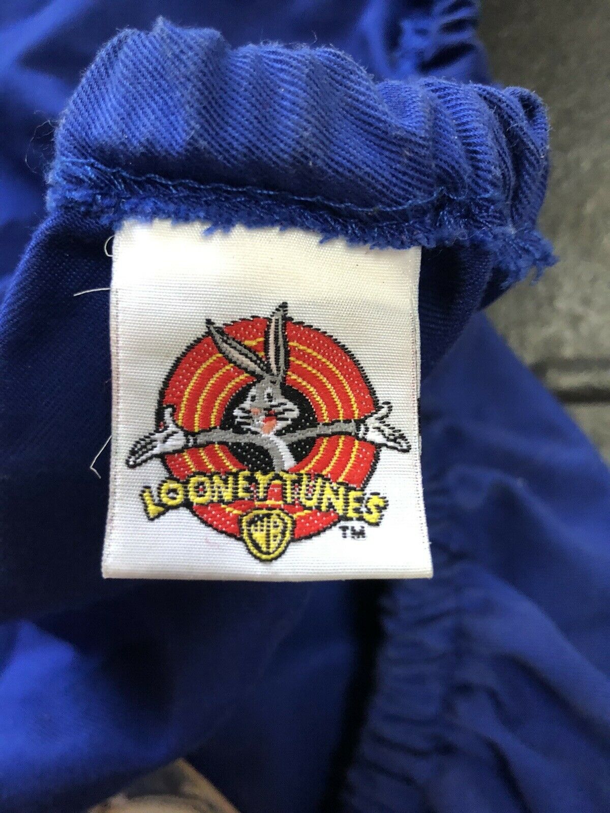 Saddle Cover - English - Looney Tunes - Fresh Stock Dated December 2025