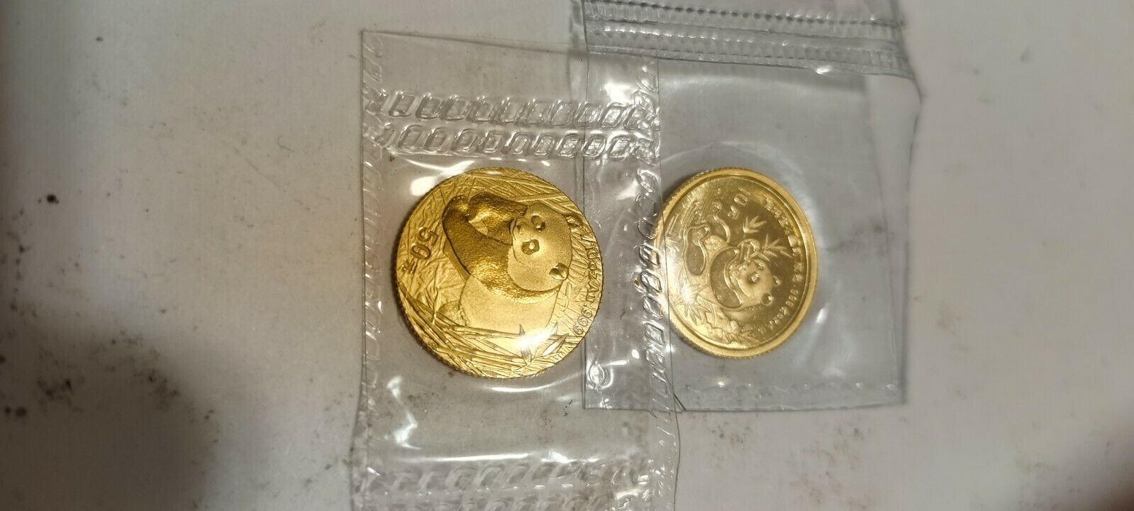 china 1/10 oz gold panda coins 1991 and 2001 in factory packaging. Mint b.u. - Fresh Stock Dated February 2026