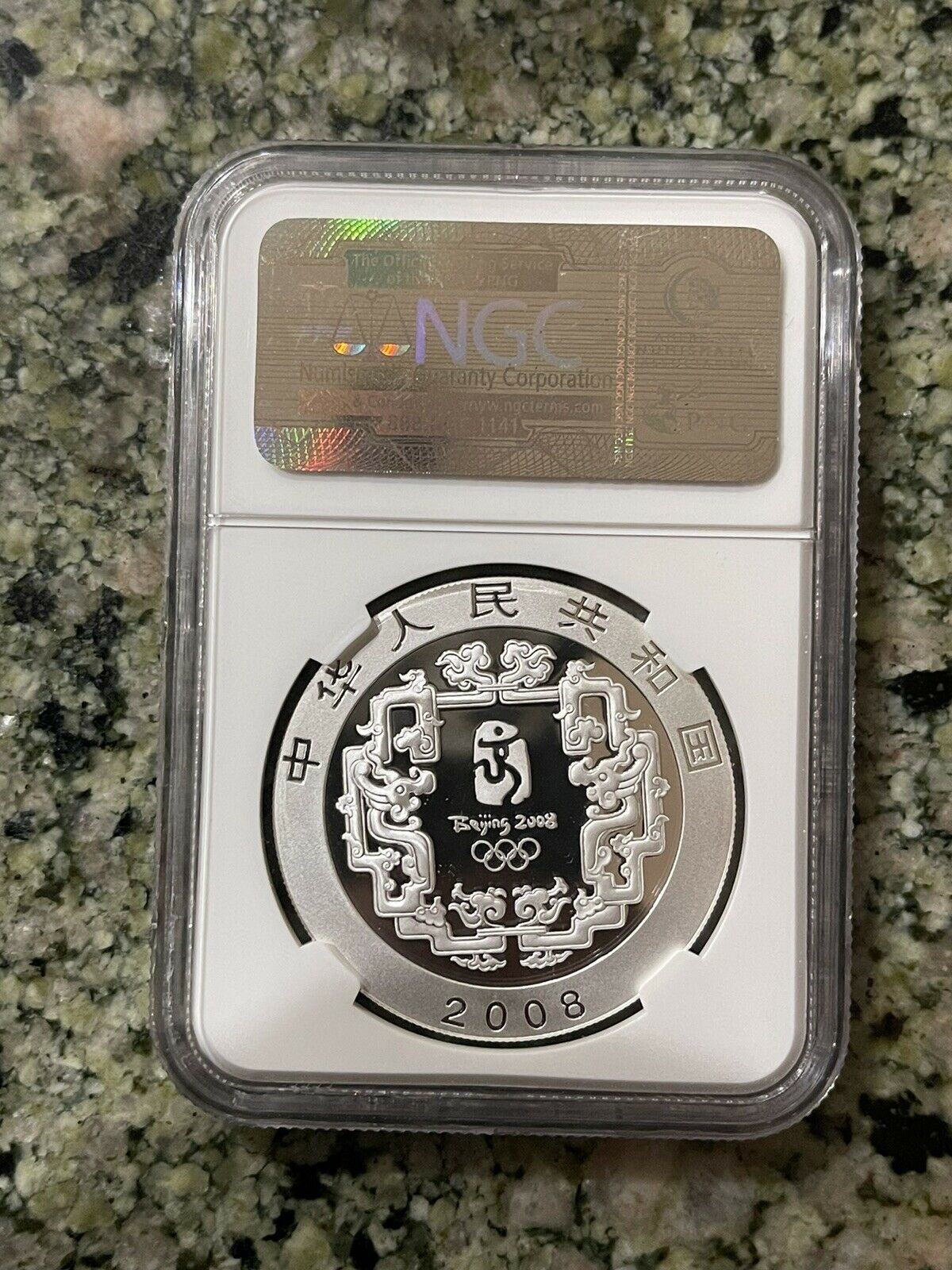 2008 China Silver 10Y Beijing Olympics shuttlecock colorized ngc pf70 - Fresh Stock Dated February 2026