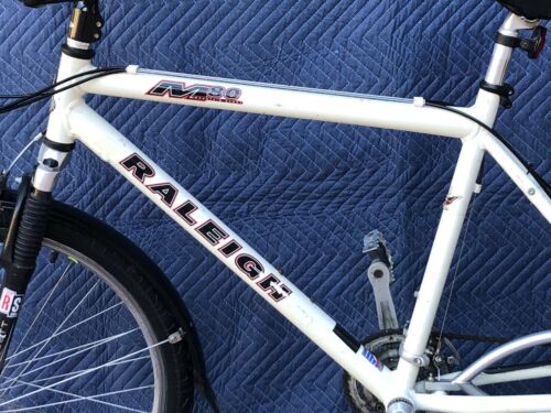 Raleigh M80 hard tail mountain bike and the Xtracycle Free Radical Cargo bike - Fresh Stock Dated December 2025