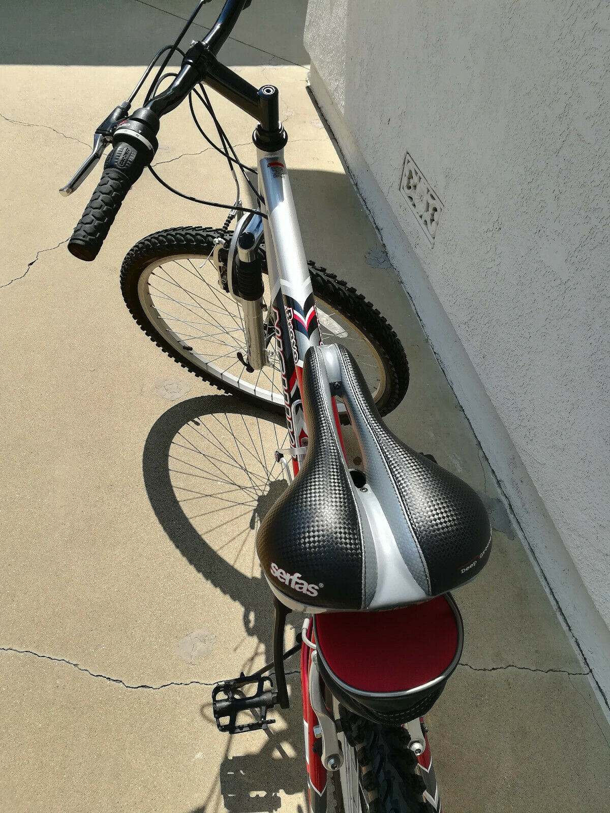 Used Men's Nishiki Bravo Shimano Mountain Bike, Red & Black Bike Sport Bike - Fresh Stock Dated February 2026