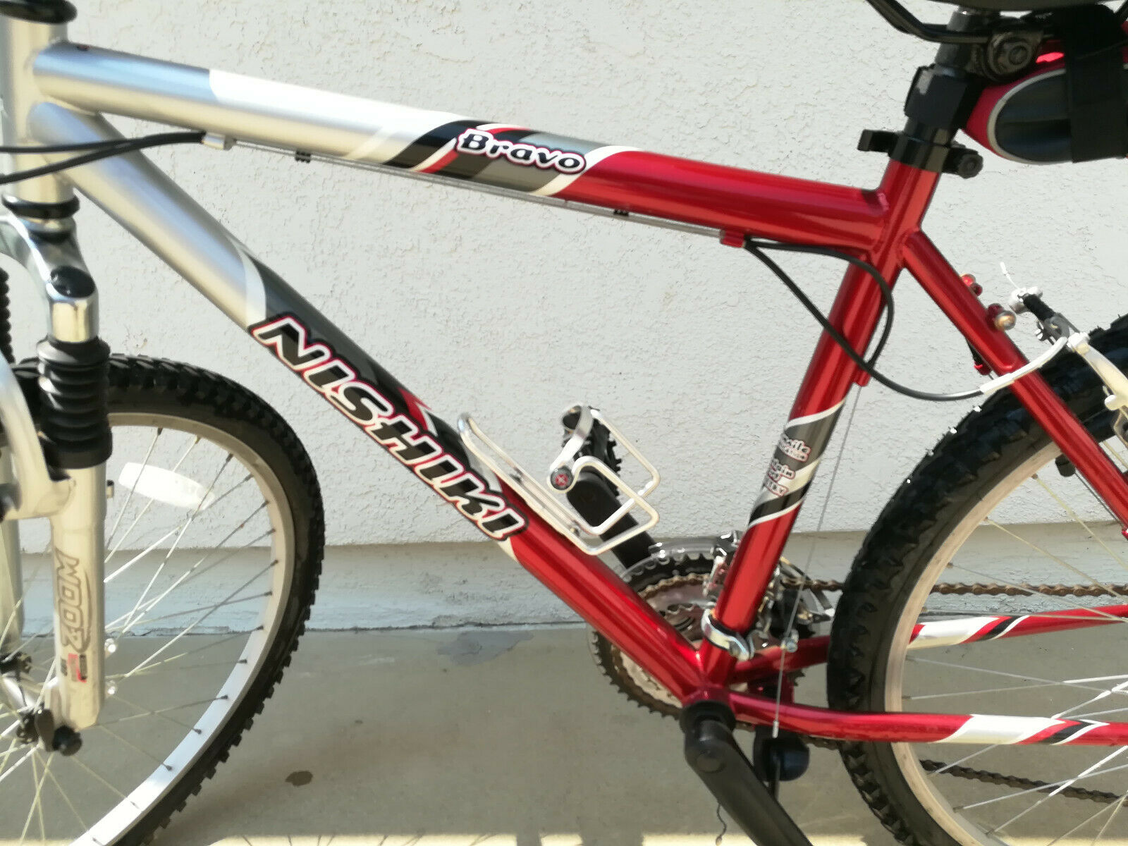 Used Men's Nishiki Bravo Shimano Mountain Bike, Red & Black Bike Sport Bike - Fresh Stock Dated February 2026