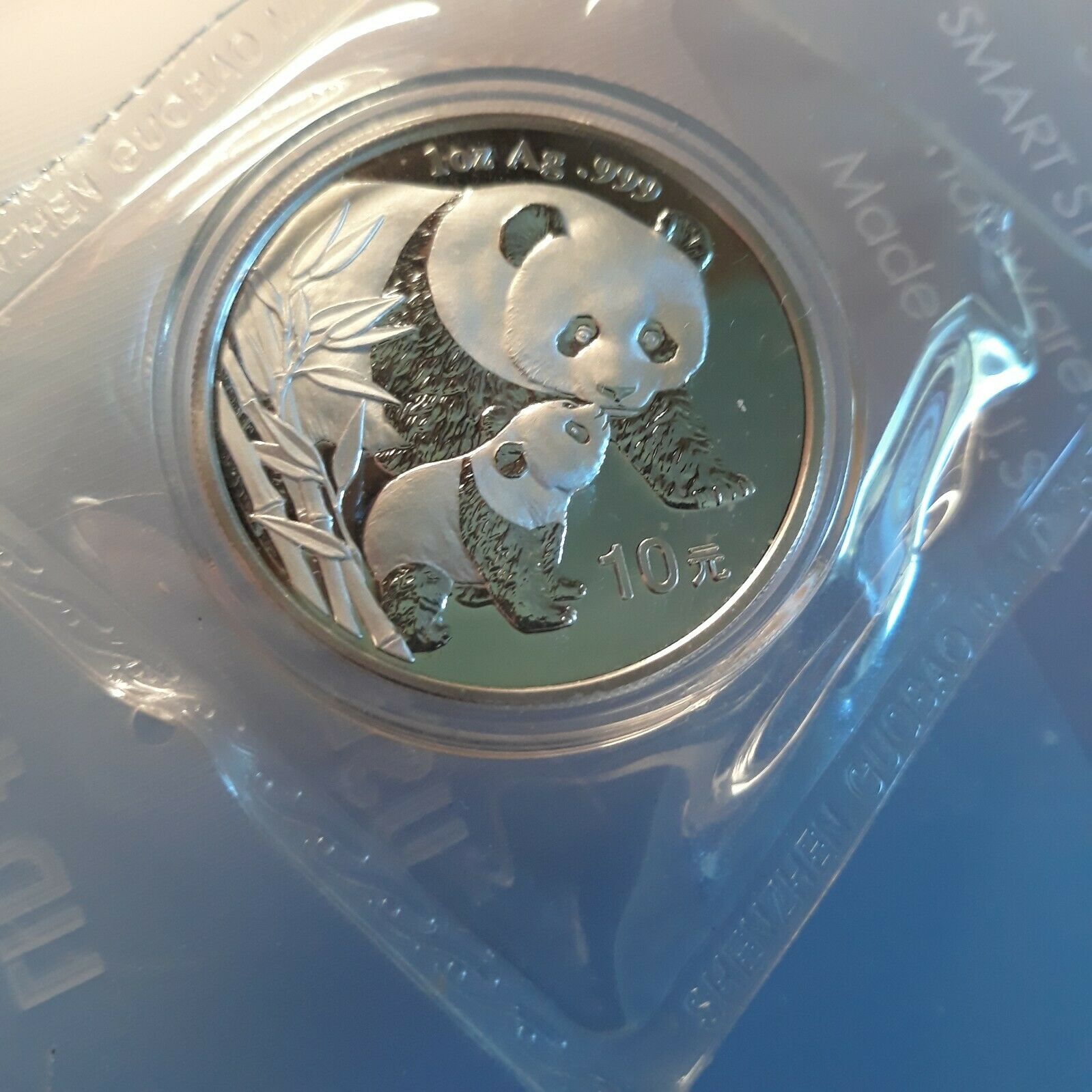 2004 Panda sealed by the Shenzhen Mint, Brilliant Uncirculated flawless gem. - Fresh Stock Dated February 2026