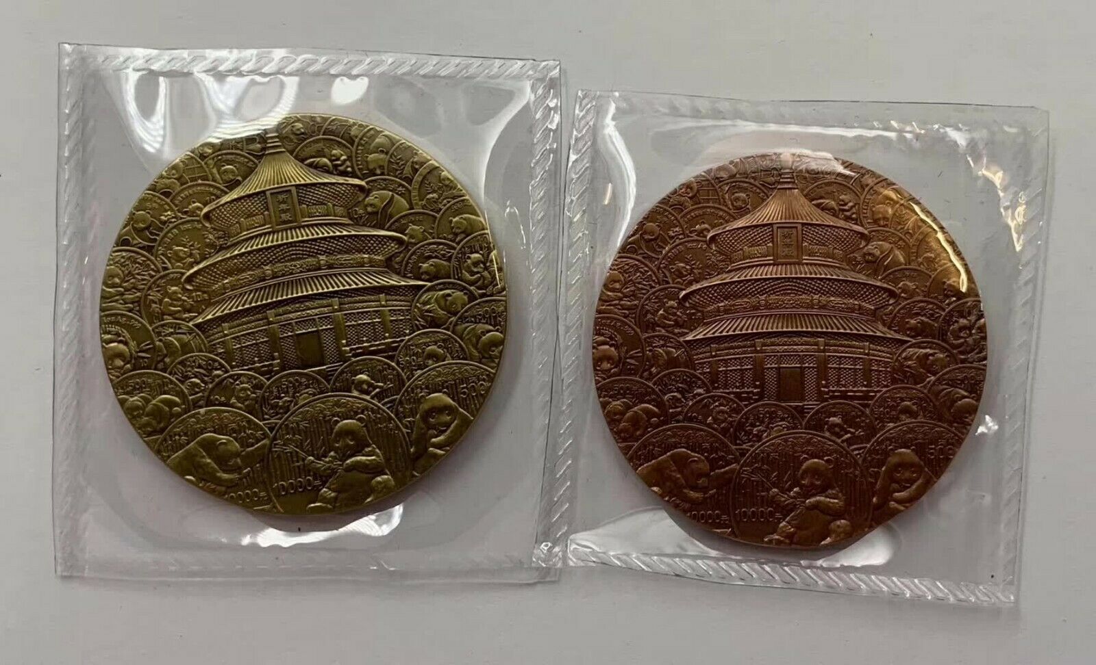 A Pair China 45mm Brass and Copper Medals - 35th Ann. Issuance Panda Gold Coin - Fresh Stock Dated February 2026