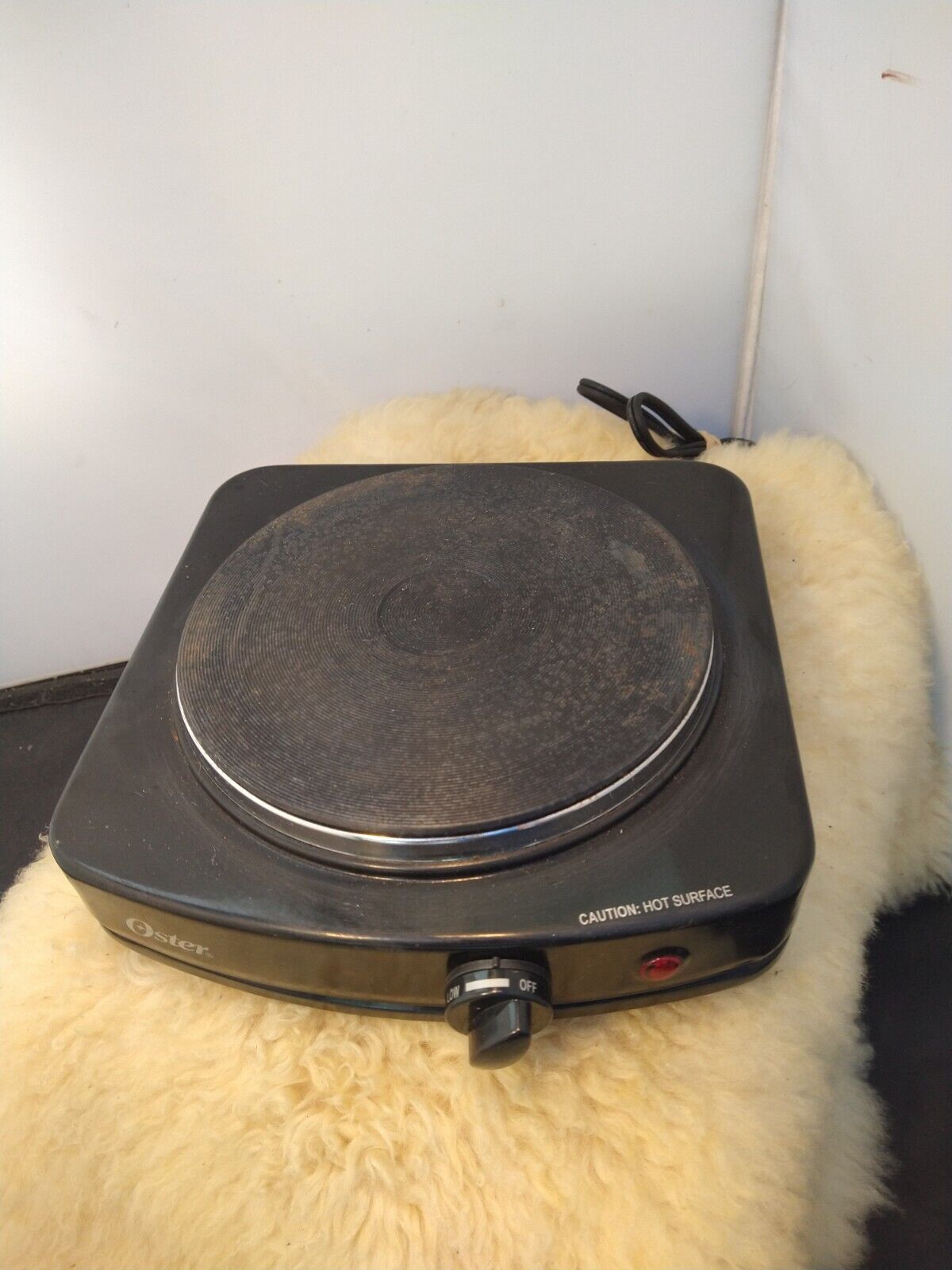 OSTER SINGLE BURNER TABLE STOVE W/ADJUSTABLE CONTROL BLACK CKSTSB100B- GOOD COND - Fresh Stock Dated February 2026