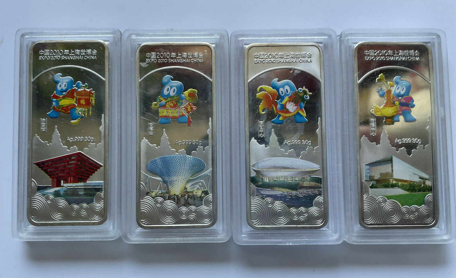 4pcs 2010 WORLD EXPO SHANGHAI MASCOT EXHIBITION HALL SILVER BAR COINS - Fresh Stock Dated February 2026