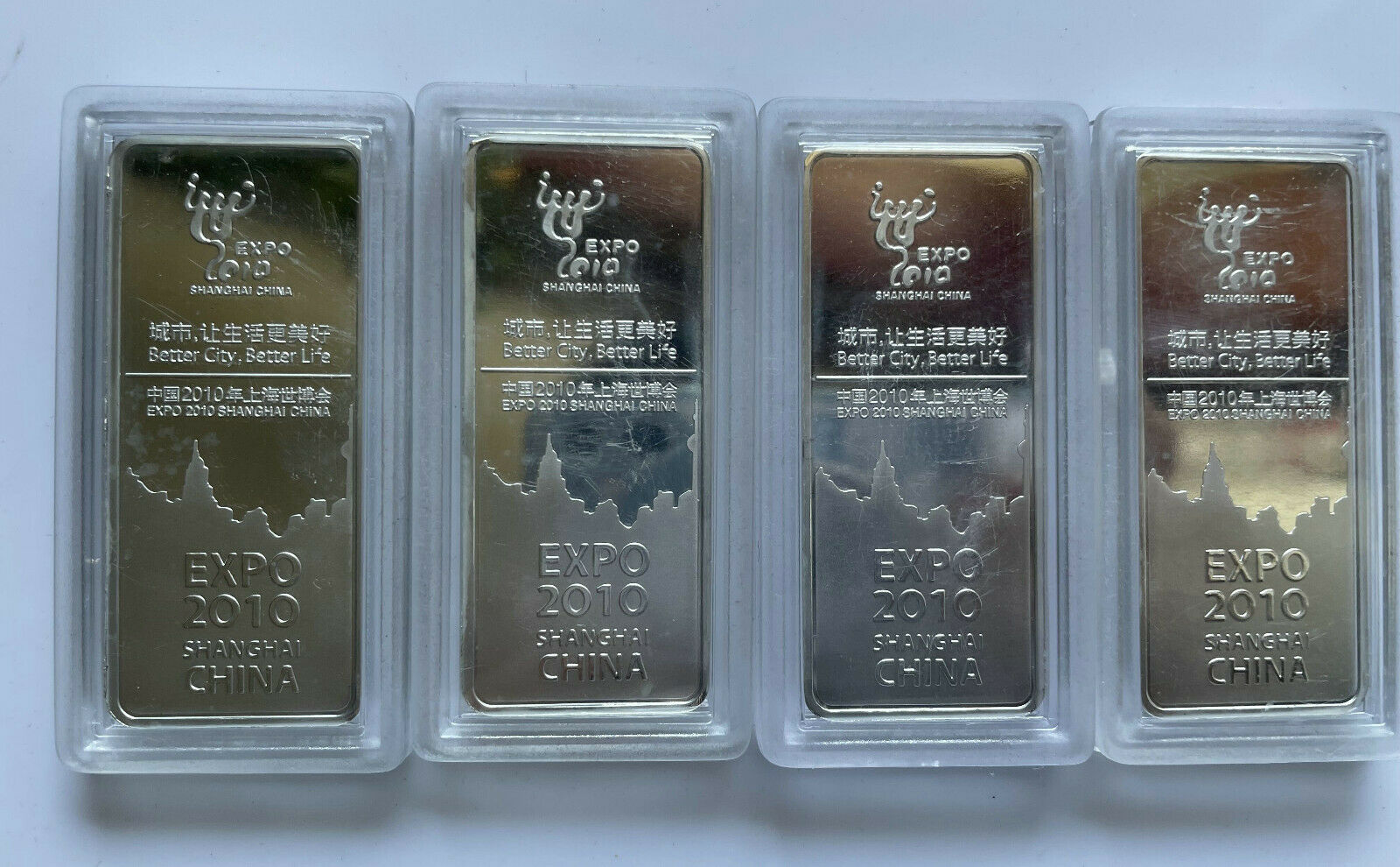 4pcs 2010 WORLD EXPO SHANGHAI MASCOT EXHIBITION HALL SILVER BAR COINS - Fresh Stock Dated February 2026