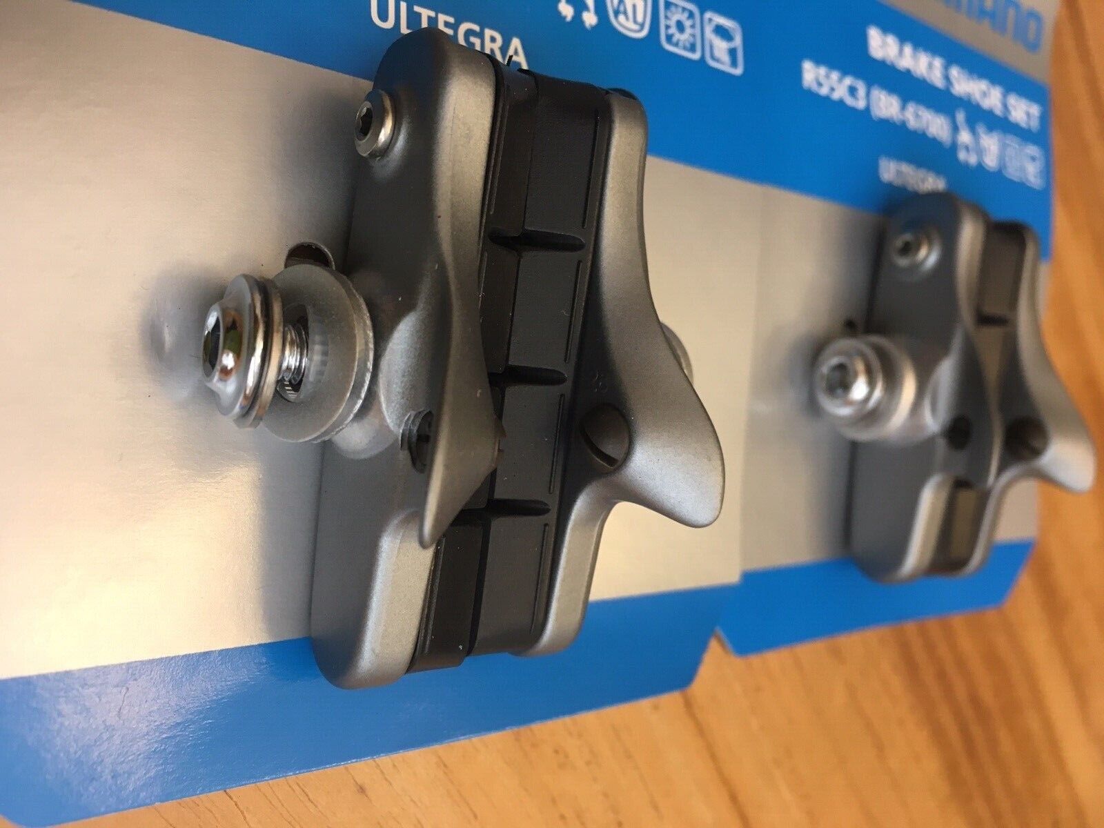 New 2 pair Shimano Ultegra R55C3 (BR-6700) brake pad holders and pads - Fresh Stock Dated February 2026