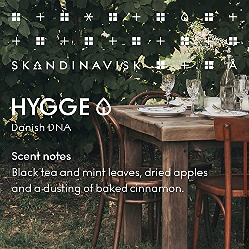 Skandinavisk Hygge 'Cosiness' Mini Scented Candle. Fragrance Notes: Black Tea and Mint Leaves, Dried Apples and Baked Cinnamon. 2.3 oz.