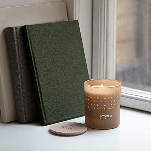 Skandinavisk Hygge 'Cosiness' Mini Scented Candle. Fragrance Notes: Black Tea and Mint Leaves, Dried Apples and Baked Cinnamon. 2.3 oz.